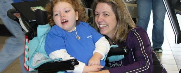 woman with a child in a wheelchair